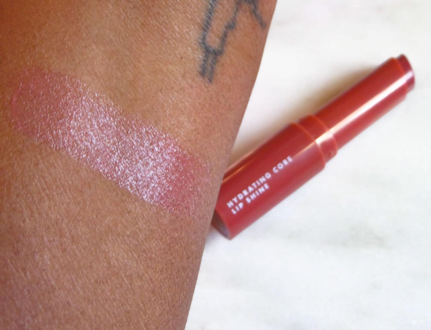 ELF Cosmetics Core Lip Shine in Happy Swatch on Dark Skin